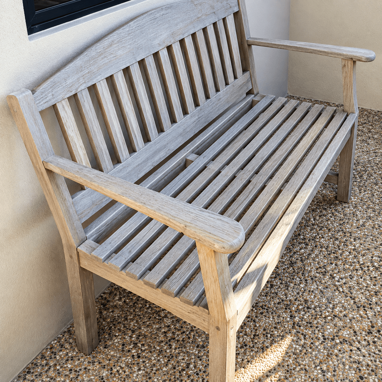 Custom outdoor wood bench built for open-air seating